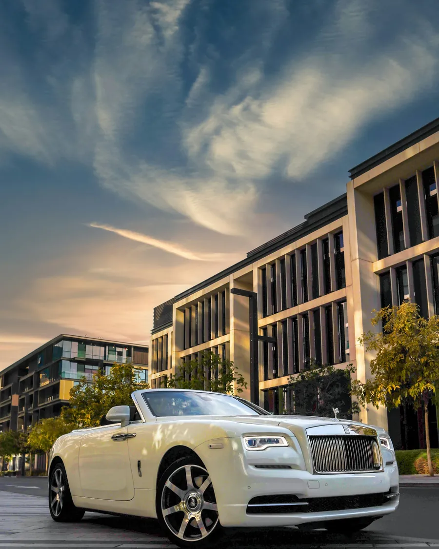 A white luxury convertible parked in Dubai