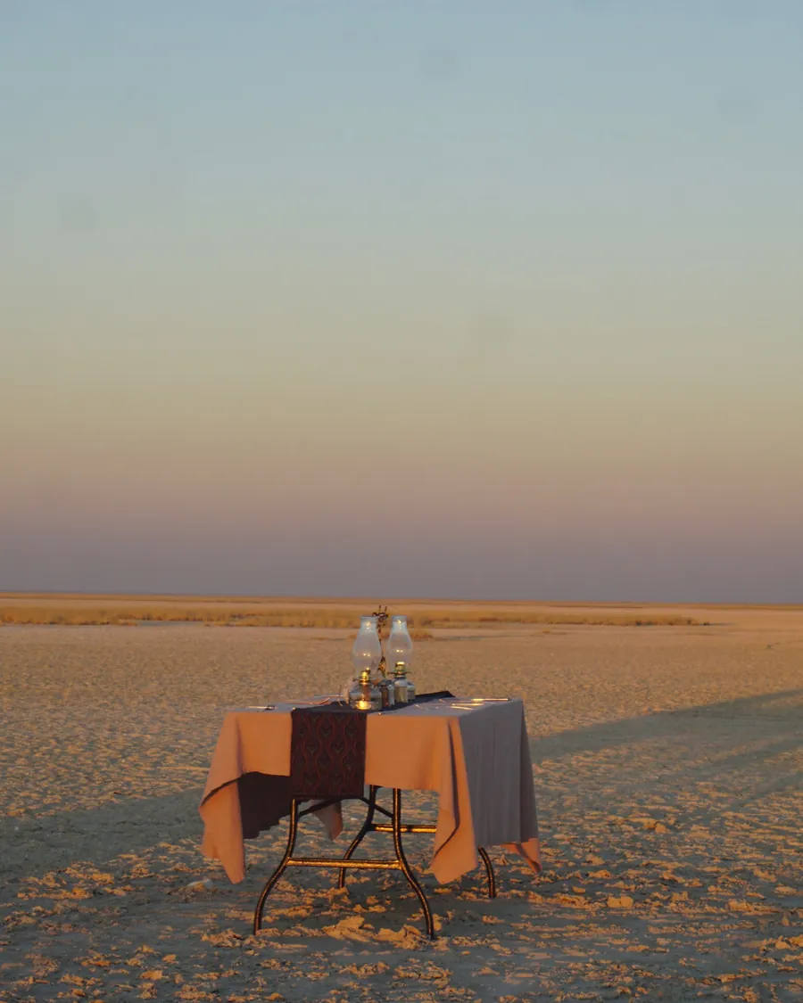 A table set for dinner in the desert