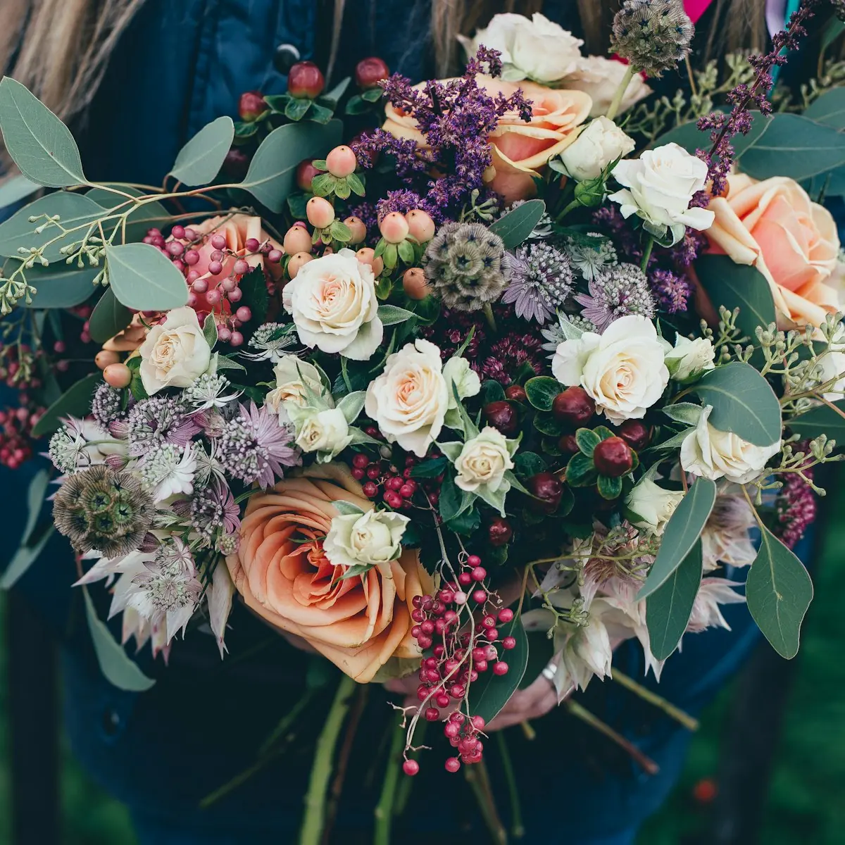A bouquet of roses and garden flowers