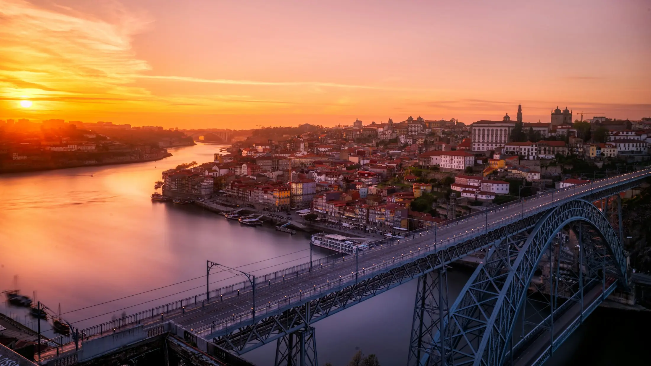 Porto and the Dom Luís bridge over the Douro at sunset